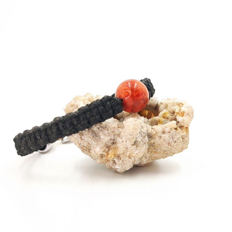 Armband aus gewebtem Seil mit orangefarbener Gorgonienperle