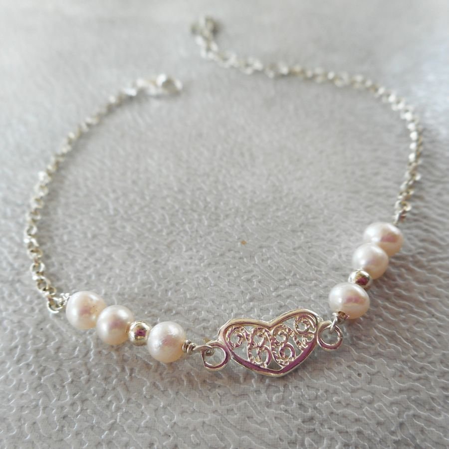 Bracelet en perles de culture avec coeur en argent 925